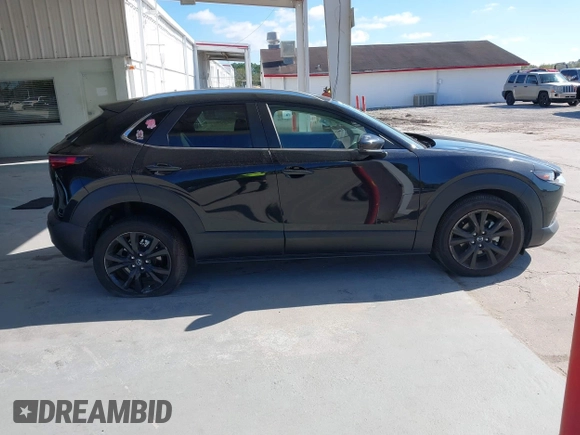 2022 Mazda CX-30 2.5 Turbo with VIN 3MVDMBAY3NM440688, listed as a IAAI auction lot 40860258 with 27,445 mi miles and . Bid and sale history available at DreamBid. Image 13.