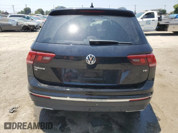 2018 Volkswagen Tiguan SEL with VIN 3VV3B7AX0JM051848, listed as a Copart auction lot 60320655 with 75,141 mi miles and Salvage title. Bid and sale history available at DreamBid. Image 6.
