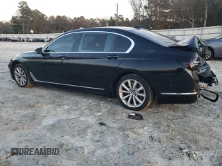 2017 BMW 7 Series 740i xDrive with VIN WBA7E4C55HGU99795, listed as a Copart auction lot 85545124 with 99,304 mi miles and Salvage Title. Bid and sale history available at carsss.com. Image 2.