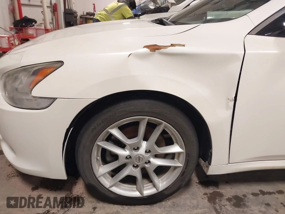 2014 Nissan Maxima S with VIN 1N4AA5AP1EC439827, listed as a IAAI auction lot 41847464 with 135,205 mi miles and . Bid and sale history available at DreamBid. Image 18.