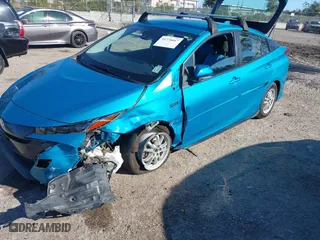 2022 Toyota Prius Prime LE with VIN JTDKAMFP3N3207926, listed as a IAAI auction lot 41276667 with 55,593 mi miles. Bid and sale history available at carsss.com. Image 17.