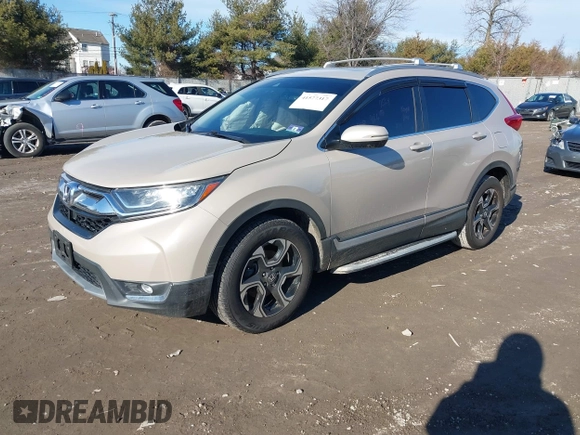 2017 Honda CR-V Touring with VIN 5J6RW2H94HL013536, listed as a IAAI auction lot 41577317 with 97,132 mi miles. Bid and sale history available at carsss.com. Image 2.
