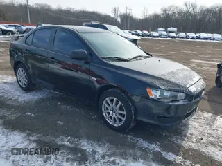 2009 Mitsubishi Lancer DE with VIN JA3AU16U39U000541, listed as a IAAI auction lot 41388897 with 226,951 mi miles. Bid and sale history available at carsss.com. Image 1.