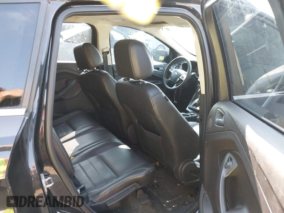 2014 Ford Escape Titanium with VIN 1FMCU9J93EUD60149, listed as a IAAI auction lot 39837388 with 154,880 mi miles. Bid and sale history available at carsss.com. Image 8.