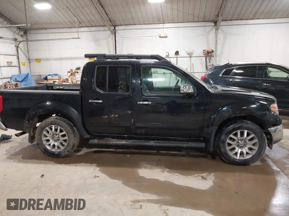 2010 Nissan Frontier Pro-4X z VIN 1N6AD0EV6AC443991, wystawiony jako IAAI lot #41849114 z przebiegiem 235 361 mil mil oraz . Historia ofert i sprzedaży dostępna na DreamBid. Obrazek 14.