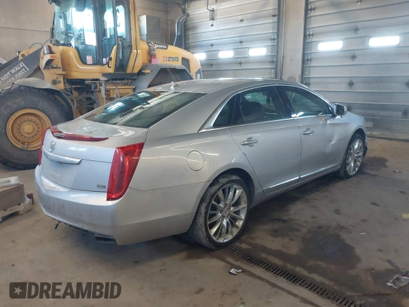 2013 Cadillac XTS Platinum with VIN 2G61V5S31D9190738, listed as a IAAI auction lot 41657461 with 136,924 mi miles and . Bid and sale history available at carsss.com. Image 4.