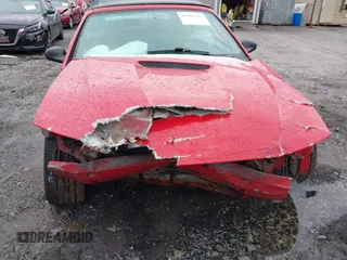 1999 Ford Mustang GT z VIN 1FAFP45XXXF127807, wystawiony jako IAAI lot #41302411 z przebiegiem 156 680 mil mil oraz . Historia ofert i sprzedaży dostępna na DreamBid. Obrazek 6.