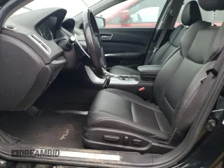 2020 Acura TLX with VIN 19UUB2F33LA001894, listed as a Copart auction lot 56940905 with 58,248 mi miles and Salvage title. Bid and sale history available at DreamBid. Image 7.