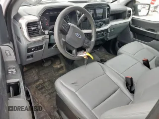 2022 Ford F-150 XL with VIN 1FTMF1C56NKD24644, listed as a Copart auction lot 63307315 with 64,704 mi miles and Salvage title. Bid and sale history available at DreamBid. Image 8.