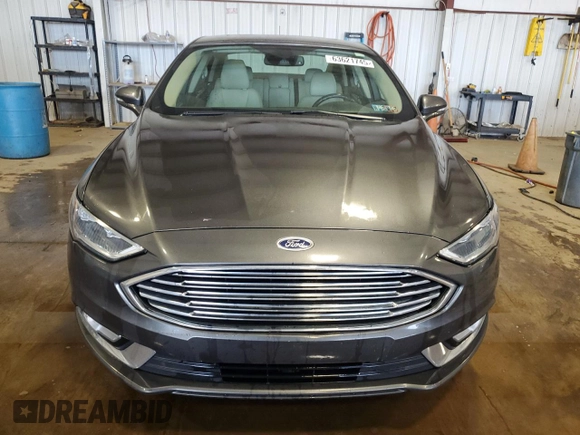 2017 Ford Fusion Titanium z VIN 3FA6P0D93HR303905, wystawiony jako Copart lot #63621745 z przebiegiem 120 249 mil mil oraz Szkoda całkowita • Salvage title. Historia ofert i sprzedaży dostępna na DreamBid. Obrazek 5.