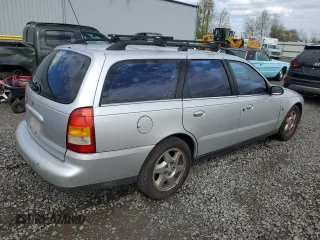 2002 Saturn LW z VIN 1G8JW84RX2Y574971, wystawiony jako Copart lot #52973795 z przebiegiem 155 227 mil mil oraz Tytuł czysty. Historia ofert i sprzedaży dostępna na DreamBid. Obrazek 3.