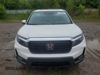 2023 Honda Ridgeline RTL-E with VIN 5FPYK3F78PB015187, listed as a Copart auction lot 57655465 with 57,704 mi miles and Salvage title. Bid and sale history available at DreamBid. Image 5.
