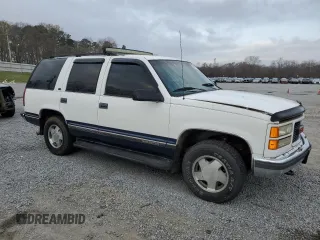 1997 GMC Yukon with VIN 1GKEK13R4VJ700223, listed as a Copart auction lot 49840845 with 231,512 mi miles and Salvage Title. Bid and sale history available at carsss.com. Image 4.