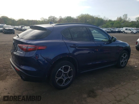 2018 Alfa Romeo Stelvio Sport z VIN ZASFAKPN8J7B69591, wystawiony jako Copart lot #54693475 z przebiegiem 98 148 mil mil oraz Szkody całkowita. Historia ofert i sprzedaży dostępna na DreamBid. Obrazek 3.