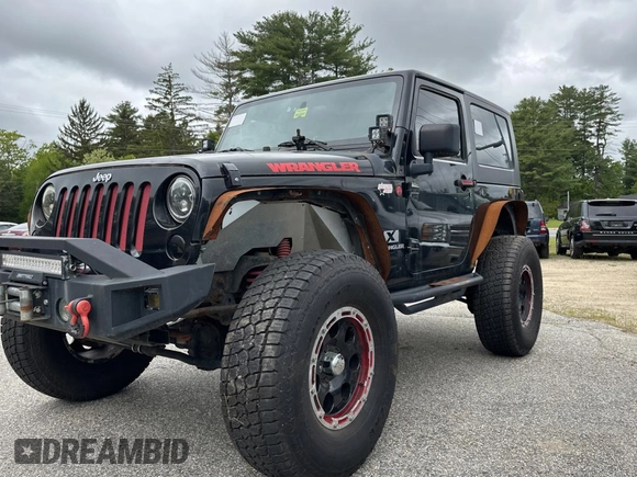 2008 Jeep Wrangler X with VIN 1J4FA24168L582227, listed as a Copart auction lot 58219065 with 98,284 mi miles and Salvage title. Bid and sale history available at DreamBid. Image 2.