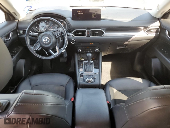 2021 Mazda CX-5 Touring z VIN JM3KFBCM8M0321766, wystawiony jako Copart lot #52845085 z przebiegiem 115 627 mil mil oraz Szkody całkowita. Historia ofert i sprzedaży dostępna na DreamBid. Obrazek 8.