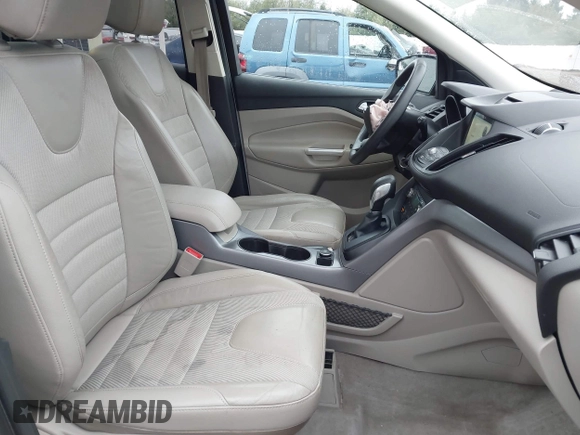 2016 Ford Escape SE z VIN 1FMCU9GX8GUA92661, wystawiony jako IAAI lot #41085877 z przebiegiem 76 632 mil mil oraz . Historia ofert i sprzedaży dostępna na DreamBid. Obrazek 5.