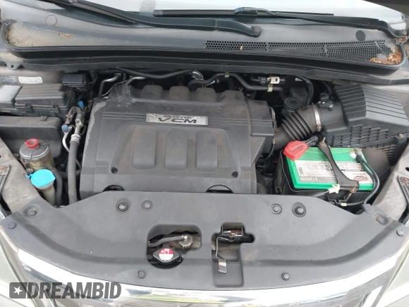 2009 Honda Odyssey EX-L with VIN 5FNRL38759B022866, listed as a IAAI auction lot 42200965 with 145,641 mi miles and . Bid and sale history available at DreamBid. Image 10.