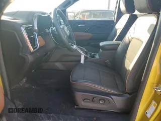 2023 GMC Canyon 4WD AT4 with VIN 1GTP6DEKXP1143203, listed as a Copart auction lot 88508335 with 13,887 mi miles and Salvage Title. Bid and sale history available at carsss.com. Image 7.