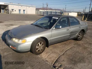 1994 Honda Accord EX with VIN JHMCD5652RC124279, listed as a Copart auction lot 79766874 with 321,505 mi miles and Salvage Title. Bid and sale history available at carsss.com. Image 1.