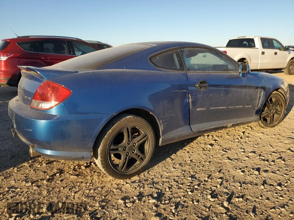 2005 Hyundai Tiburon GT z VIN KMHHN65F35U186438, wystawiony jako Copart lot #41879955 z przebiegiem 152 574 mil mil oraz Szkoda całkowita • Salvage title. Historia ofert i sprzedaży dostępna na DreamBid. Obrazek 3.