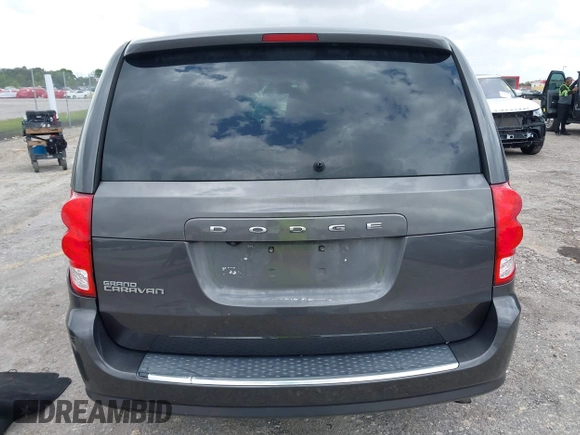 2019 Dodge Grand Caravan SE with VIN 2C4RDGBGXKR796974, listed as a IAAI auction lot 42008704 with 129,229 mi miles and . Bid and sale history available at DreamBid. Image 16.