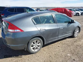 2011 Honda Insight EX with VIN JHMZE2H77BS006244, listed as a IAAI auction lot 41774240 with Not Provided miles and . Bid and sale history available at DreamBid. Image 4.