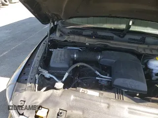 2023 Ram 1500 SLT with VIN 1C6RR7LGXPS595444, listed as a Copart auction lot 65205395 with 31,187 mi miles and Salvage title. Bid and sale history available at DreamBid. Image 14.