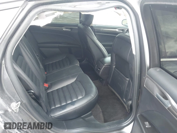 2019 Ford Fusion SEL with VIN 3FA6P0CD6KR141832, listed as a IAAI auction lot 41800102 with 142,282 mi miles and . Bid and sale history available at DreamBid. Image 8.