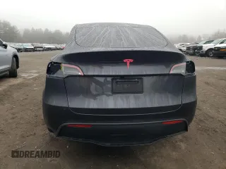 2025 Tesla Model Y Long Range z VIN 7SAYGDED9SF269767, wystawiony jako Copart lot #51588985 z przebiegiem 1 943 mil mil oraz Szkoda całkowita • Salvage title. Historia ofert i sprzedaży dostępna na DreamBid. Obrazek 6.