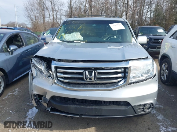 2014 Honda Pilot Touring with VIN 5FNYF4H9XEB038551, listed as a IAAI auction lot 41585720 with 150,725 mi miles and . Bid and sale history available at carsss.com. Image 12.