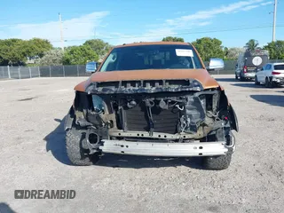 2016 Toyota Tundra SR z VIN 5TFRM5F19GX102715, wystawiony jako IAAI lot #41265300 z przebiegiem 109 619 mil mil oraz . Historia ofert i sprzedaży dostępna na DreamBid. Obrazek 13.