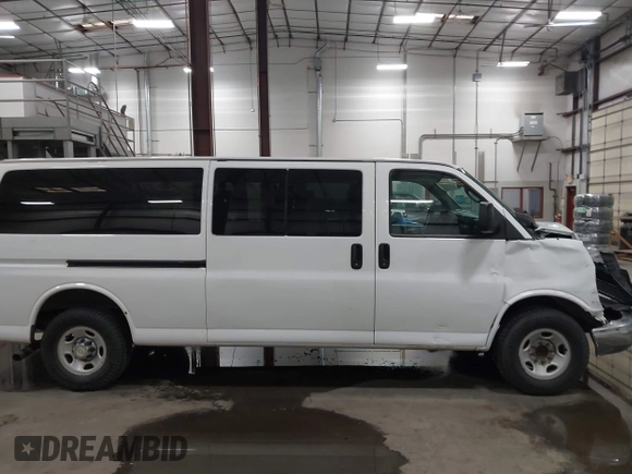 2014 Chevrolet Express Passenger LT with VIN 1GAZG1FG9E1127529, listed as a IAAI auction lot 42151349 with 192,333 mi miles and . Bid and sale history available at DreamBid. Image 13.
