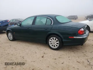 2002 Jaguar S-Type with VIN SAJDA01P12GM27242, listed as a Copart auction lot 88579215 with 218,546 mi miles and Salvage Title. Bid and sale history available at DreamBid. Image 2.