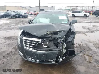 2013 Cadillac XTS Luxury with VIN 2G61R5S35D9100771, listed as a IAAI auction lot 41673766 with 41,123 mi miles. Bid and sale history available at carsss.com. Image 6.