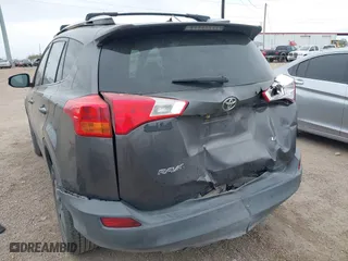 2014 Toyota RAV4 LE with VIN 2T3ZFREVXEW081655, listed as a IAAI auction lot 41583283 with 141,228 mi miles. Bid and sale history available at carsss.com. Image 3.