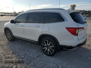 2022 Honda Pilot Touring 7-Passenger with VIN 5FNYF5H65NB011768, listed as a Copart auction lot 74134503 with 27,517 mi miles and Salvage title. Bid and sale history available at DreamBid. Image 2.