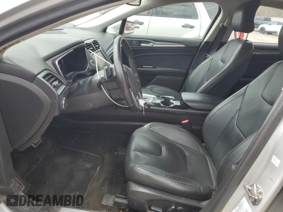 2016 Ford Fusion Titanium with VIN 3FA6P0K99GR319253, listed as a Copart auction lot 51935965 with 186,717 mi miles and Salvage Title. Bid and sale history available at DreamBid. Image 7.