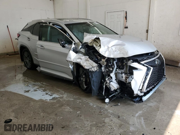 2016 Lexus RX 350 with VIN 2T2BZMCA1GC032722, listed as a Copart auction lot 59550625 with 124,611 mi miles and Salvage title. Bid and sale history available at DreamBid. Image 4.