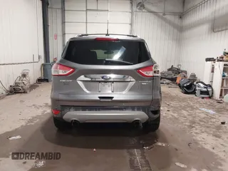 2014 Ford Escape Titanium with VIN 1FMCU9JX9EUA56421, listed as a IAAI auction lot 41392372 with 117,234 mi miles. Bid and sale history available at carsss.com. Image 17.