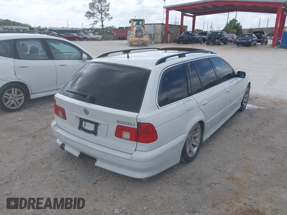 2002 BMW 5 Series 525iAT with VIN WBADS43482GD86937, listed as a IAAI auction lot 41940547 with 196,458 mi miles. Bid and sale history available at carsss.com. Image 4.