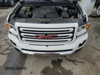 2016 GMC Canyon 4WD SLT z VIN 1GTG6DE35G1371344, wystawiony jako Copart lot #49954915 z przebiegiem 106 345 mil mil oraz Szkody całkowita. Historia ofert i sprzedaży dostępna na DreamBid. Obrazek 12.