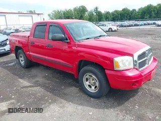 2007 Dodge Dakota SLT with VIN 1D7HW48N17S128373, listed as a IAAI auction lot 42633897 with 129,780 mi miles and . Bid and sale history available at DreamBid. Image 1.