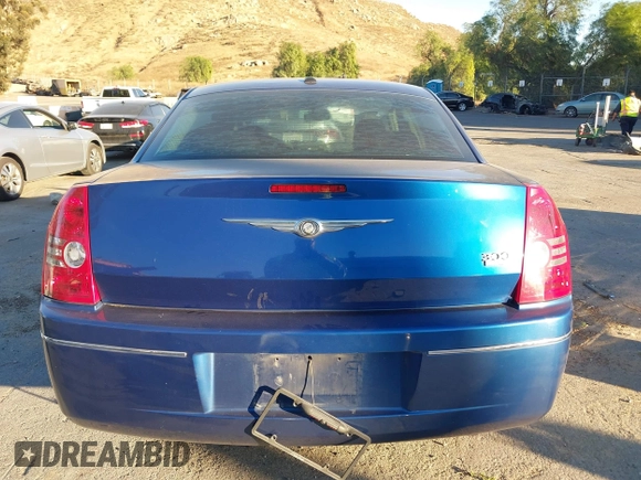 2009 Chrysler 300 Touring with VIN 2C3LA53V89H565270, listed as a IAAI auction lot 41069505 with 112,830 mi miles. Bid and sale history available at carsss.com. Image 16.