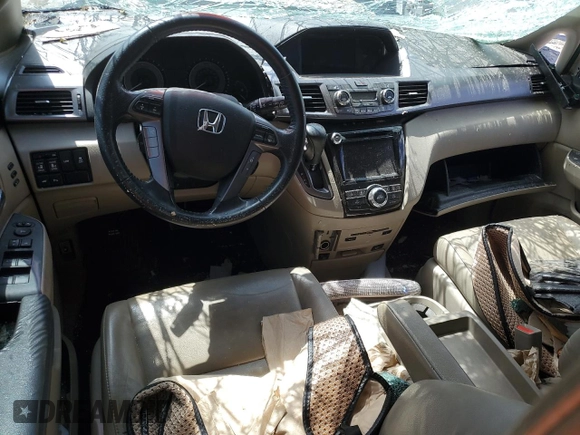 2014 Honda Odyssey Touring with VIN 5FNRL5H98EB053486, listed as a Copart auction lot 58004225 with 201,526 mi miles and Salvage title. Bid and sale history available at DreamBid. Image 8.