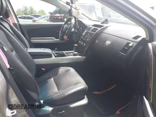 2014 Mazda CX-9 Grand Touring с VIN JM3TB2DA3E0443604, выставлен на аукционе IAAI как лот 42456552 с пробегом 150 053 миль миль и . История ставок и продаж доступна на DreamBid. Изображение 5.