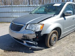 2013 Chrysler Town & Country Touring L with VIN 2C4RC1CG6DR660858, listed as a IAAI auction lot 41970976 with 140,299 mi miles and . Bid and sale history available at DreamBid. Image 6.