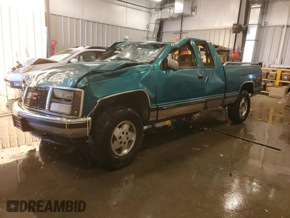 1993 GMC Sierra 1500 z VIN 2GTEK19K8P1562964, wystawiony jako Copart lot #86767744 z przebiegiem 237 615 mil mil oraz Czysty tytuł • Clean title. Historia ofert i sprzedaży dostępna na DreamBid. Obrazek 1.