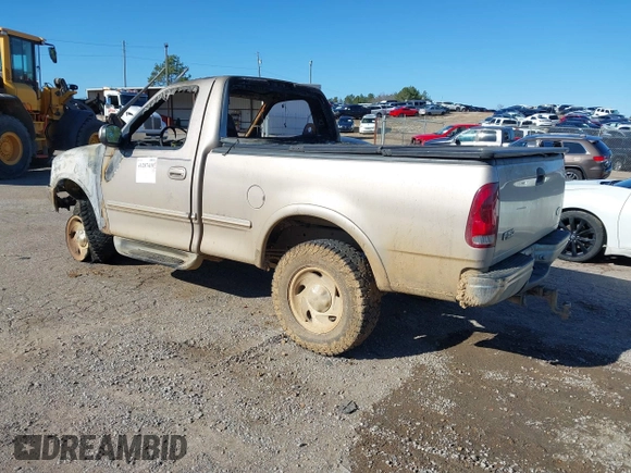 1998 Ford F-150 with VIN 1FTRF18L9WNA48859, listed as a IAAI auction lot 41287410 with Not provided miles and . Bid and sale history available at DreamBid. Image 3.
