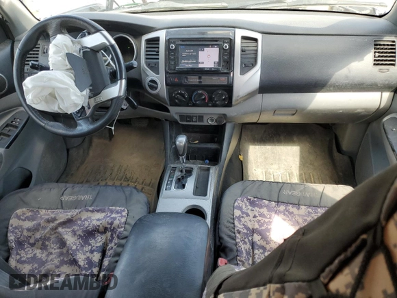 2015 Toyota Tacoma with VIN 3TMLU4EN2FM179631, listed as a Copart auction lot 57769855 with 106,288 mi miles and Salvage title. Bid and sale history available at DreamBid. Image 8.